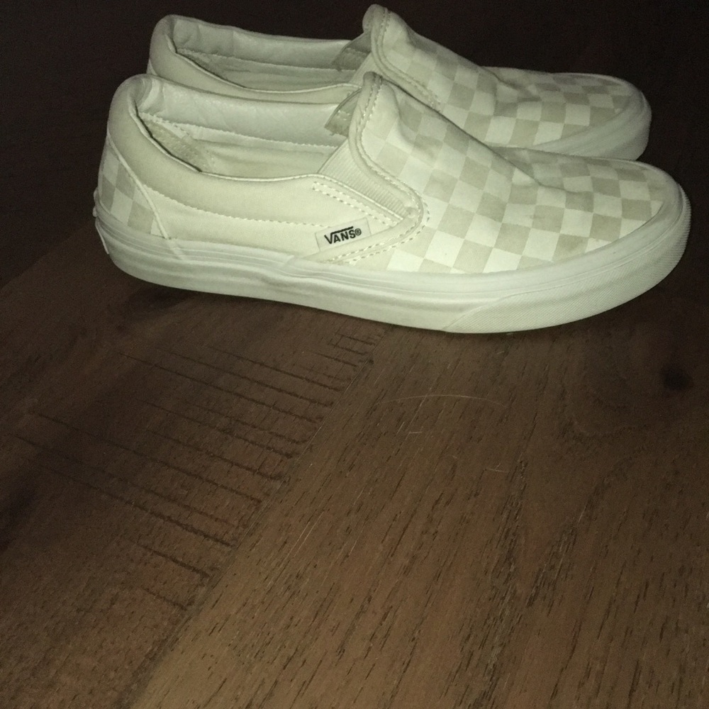 white checkerboard vans slip on
